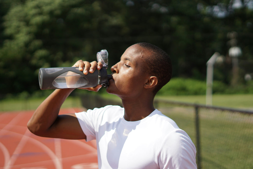 Athlete drinking hydrogen infused water 